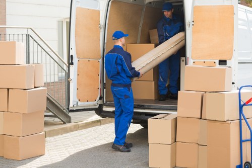 Removals van and packed boxes for a Hounslow move