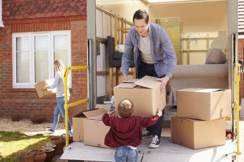 Professional movers handling furniture during a local relocation