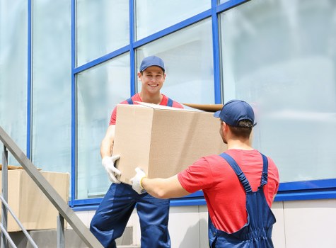 Packed business items and labelled boxes ready for relocation
