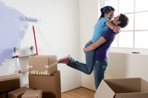 A professional removals team handling household items in Hounslow