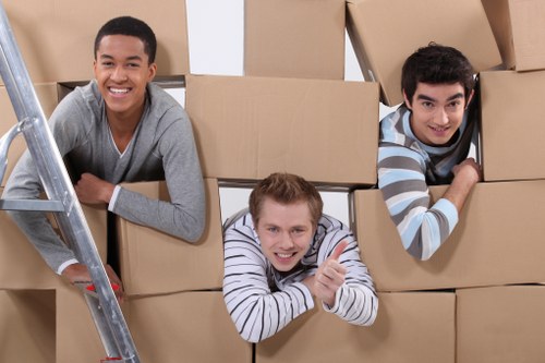 Office furniture and business equipment being relocated by a Hounslow removals team
