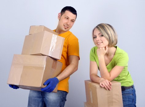 Removal staff using protective equipment during a safe move
