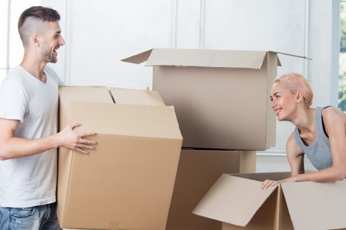 Prepared moving boxes and furniture ready for a Hounslow van service