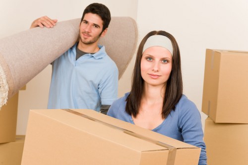 Loading furniture into a van for a Hounslow house move